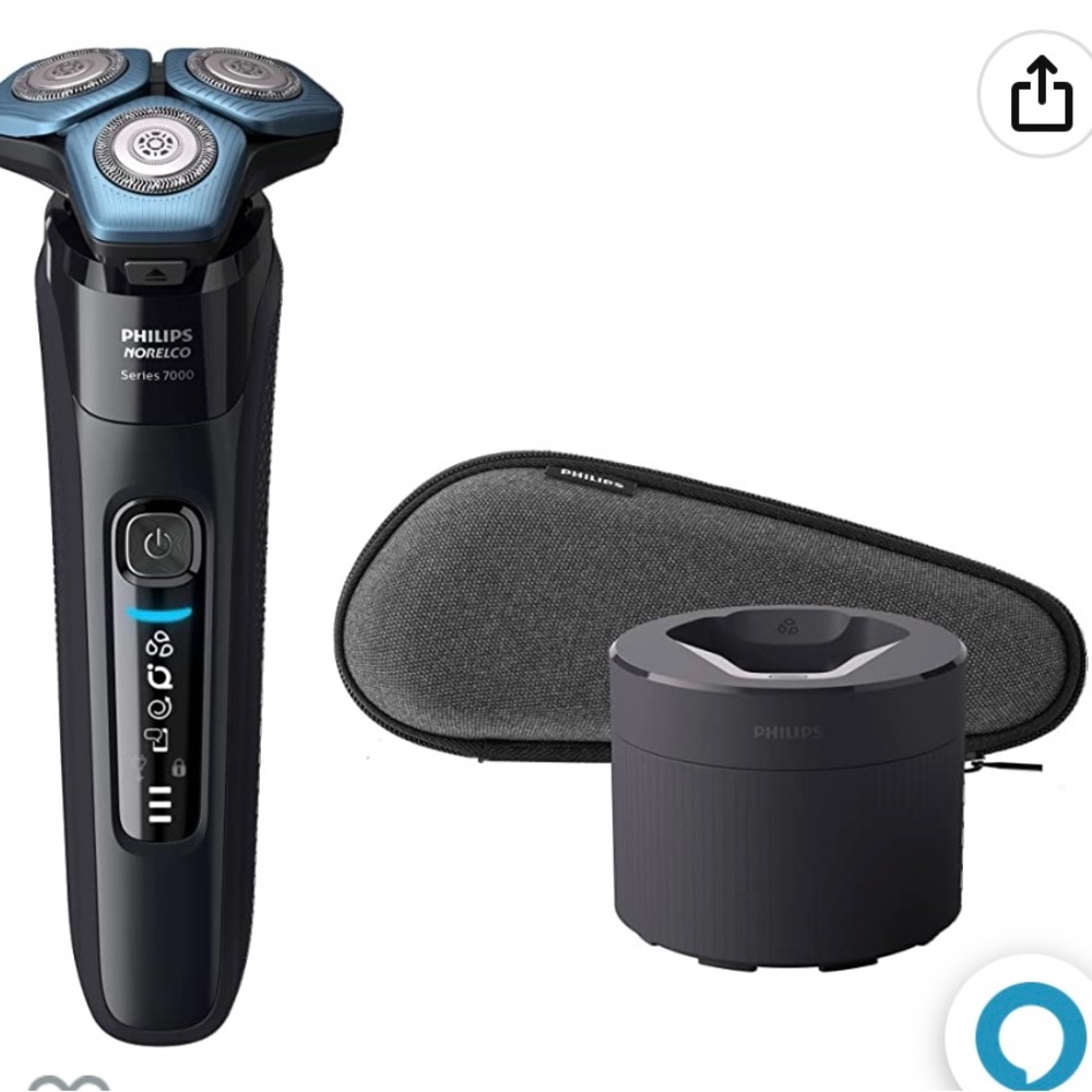 Phillips Norelco electric shaver. Comes with direction booklet. Not pictured